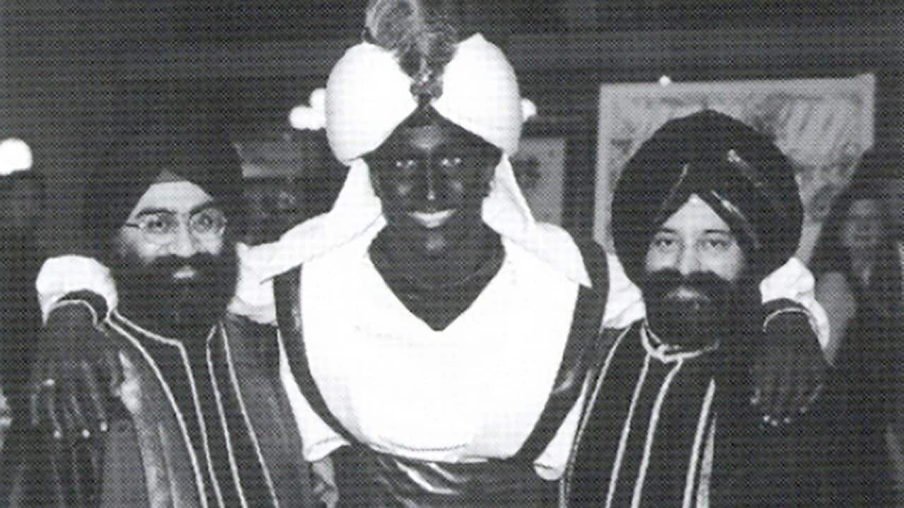 A photo shows a costumed Prime Minister Justin Trudeau, his face and hands darkened by makeup, attending a "Arabian Nights" gala.