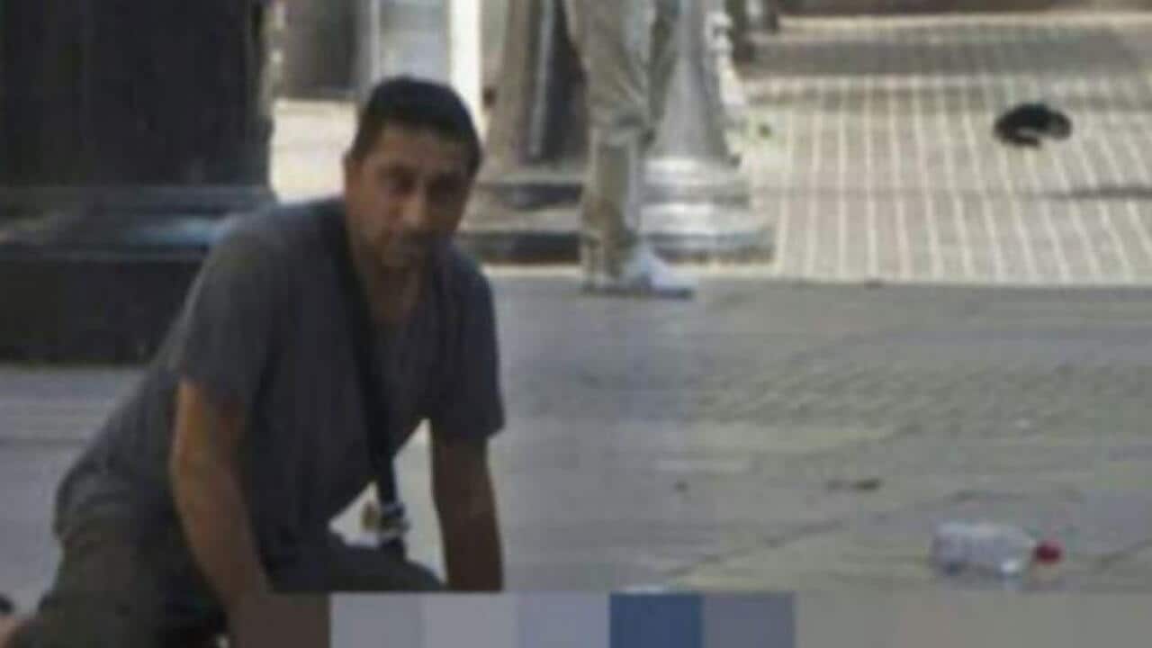 Brit tourist Harry Athwal stayed with an injured boy as cops shouted at him to flee
