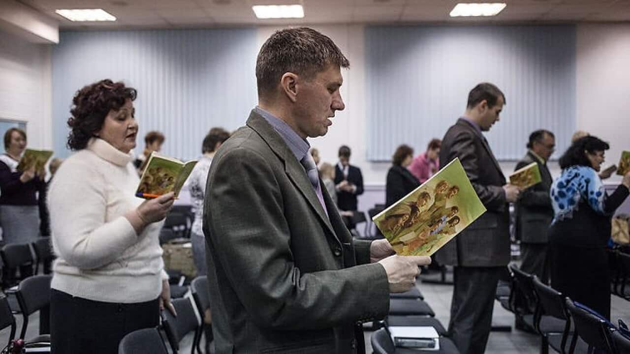 Russian Jehovah's Witnesses sing songs at the beginning of a gathering in Rostov-on-Don