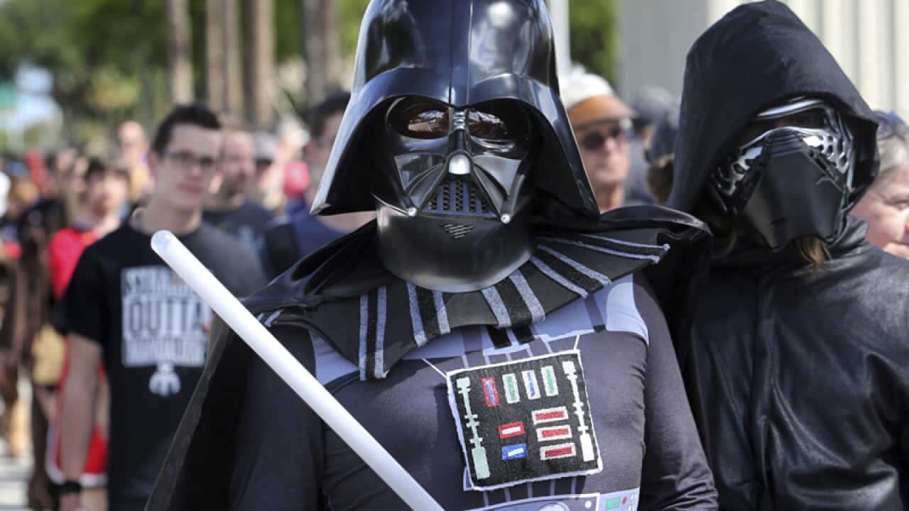 Costumed fans of the Star Wars franchise