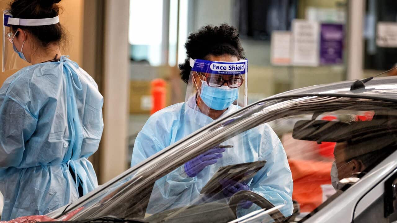 Medical staff work at a COVID-19 pop-up testing centre in South Melbourne, Friday, February 5, 2021.