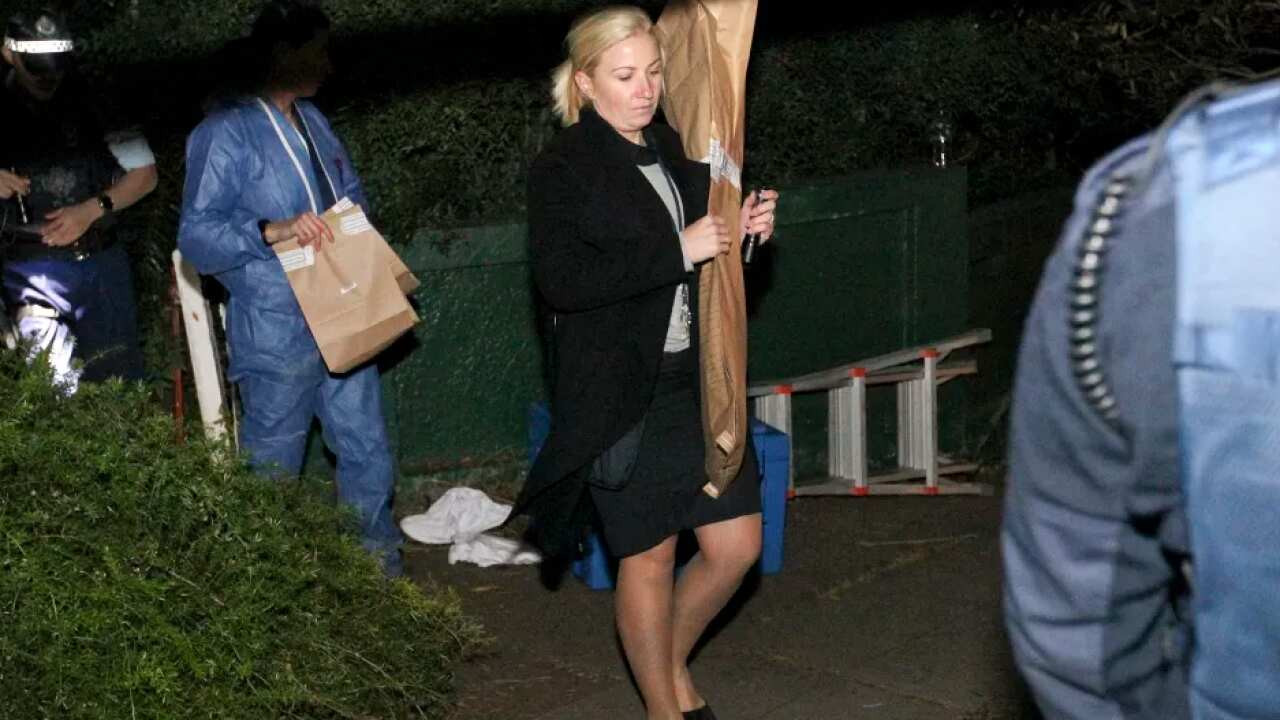 North Shore Police Area Command and the State Crime Command's Homicide Squad work at an address in Greenwich where the body was found.