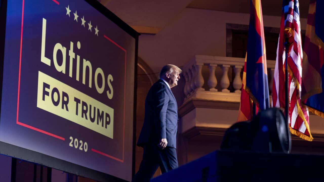 President Donald Trump arrives for a Latinos for Trump Coalition roundtable at Arizona.