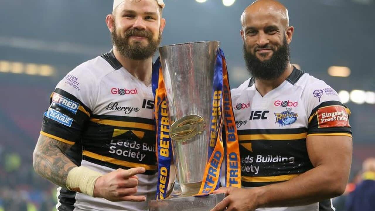 Leeds Rhinos' Cuthbertson and Jamie Jones-Buchanan celebrate.