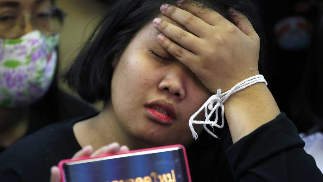 A supporter reacts to the verdict on Friday.