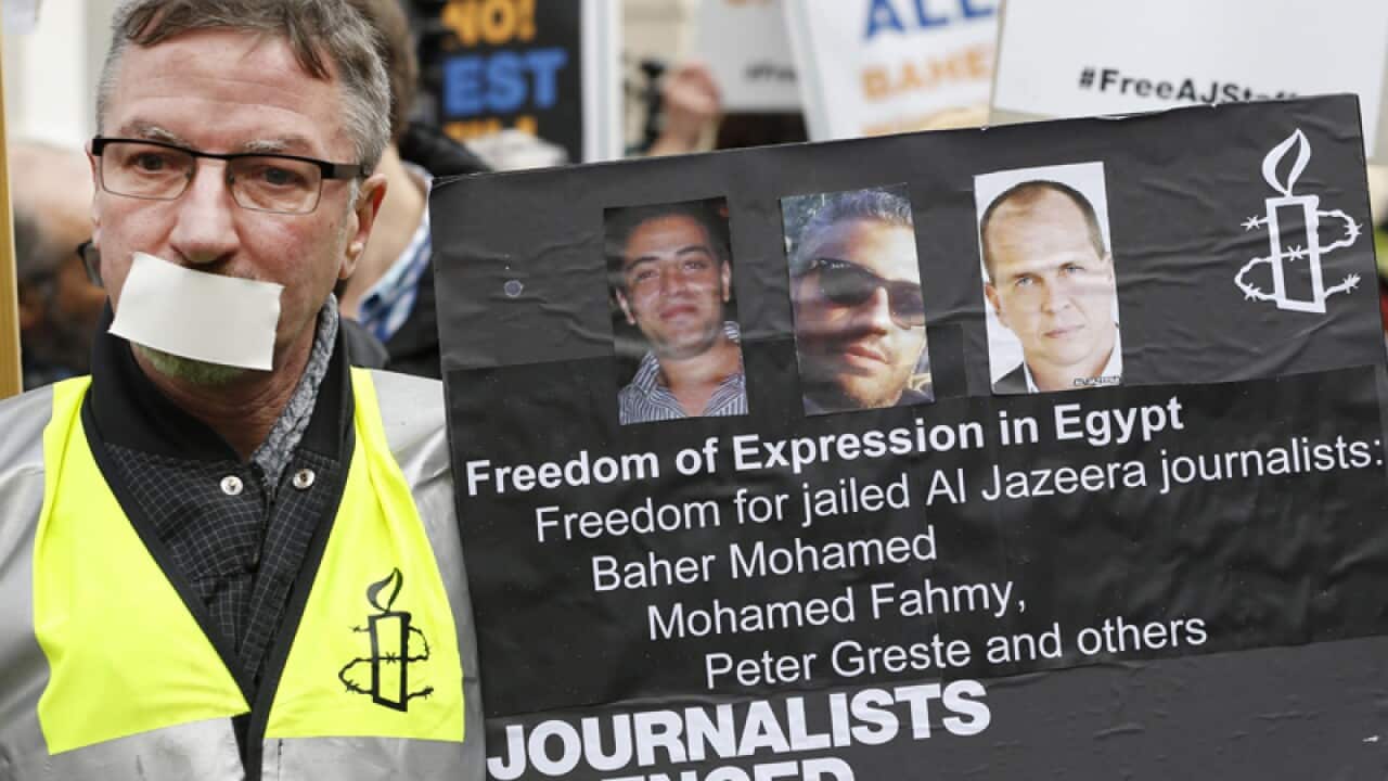 Journalists demonstrate in front of Egypt's embassy in central London