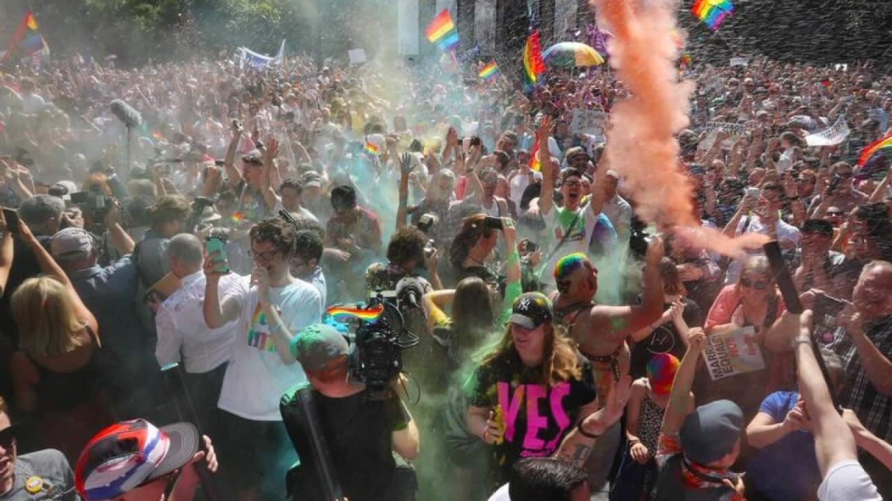 The crowd react to the same-sex marriage postal survey Yes result.