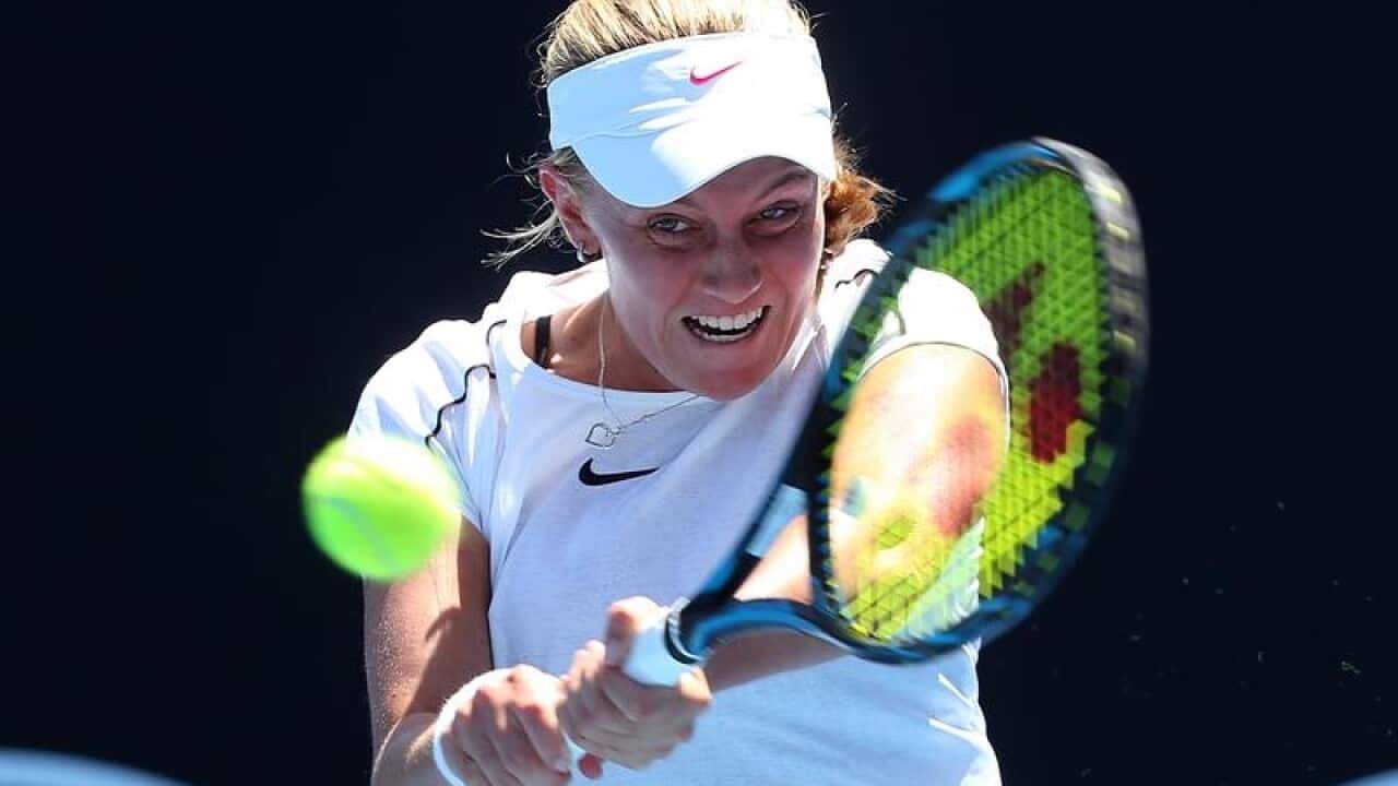 Zoe Hives of Australia in action against Bethanie Mattek-Sands.