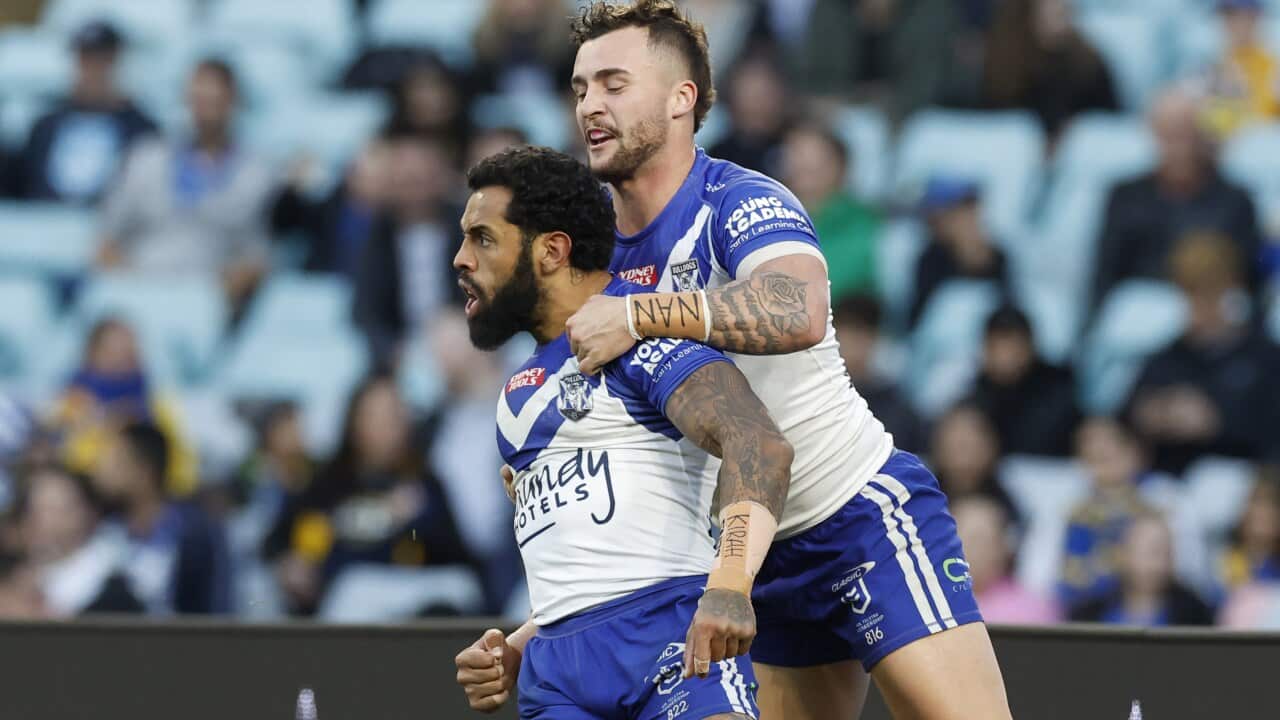 Josh Addo-Carr of the Bulldogs celebrates a try during the NRL Round 14 match between the Canterbury Bulldogs and the Parramatta Eels at Accor Stadium in Sydney, Monday, June 13, 2022. (AAP Image/Mark Evans) NO ARCHIVING, EDITORIAL USE ONLY