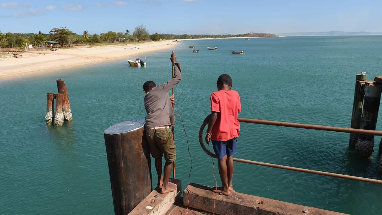Boys fishing off the dock