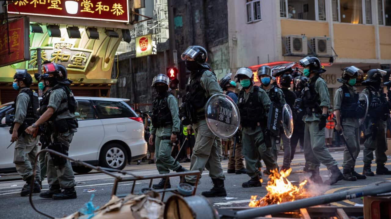 Police and protesters during a Hong Kong rally on July the 1st