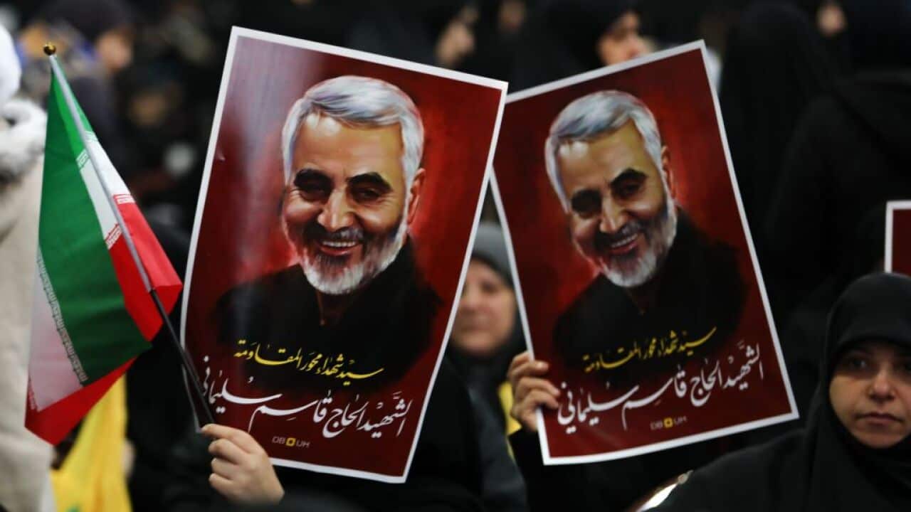 Supporters of Shiite Hezbollah movement hold posters of slain Iranian major general Qasem Soleimani in the Lebanese capital Beirut.