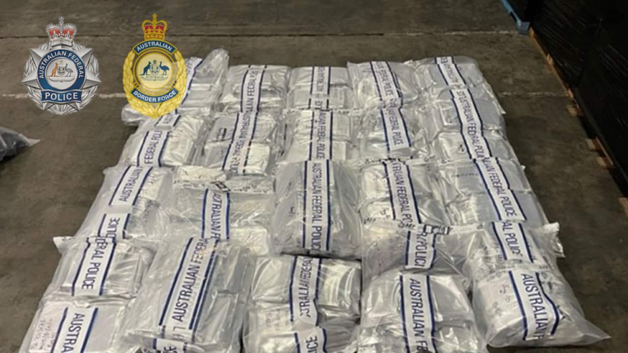 The AFP has launched a major investigation after more than $182 million worth of illicit drugs was seized in Melbourne, concealed inside a shipment of coffee beans.