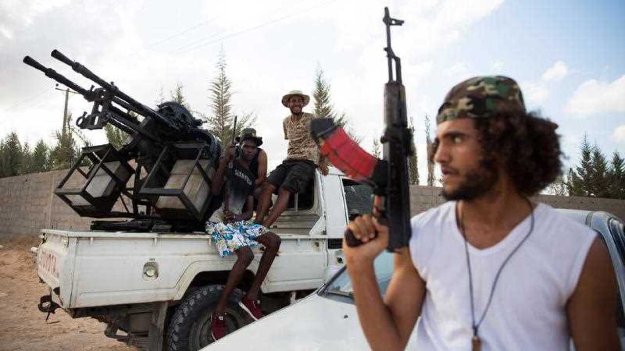 Libyan forces loyal to the Government of National Accord (GNA), Libya's internationally recognised government, guard from a position south of Tripoli.