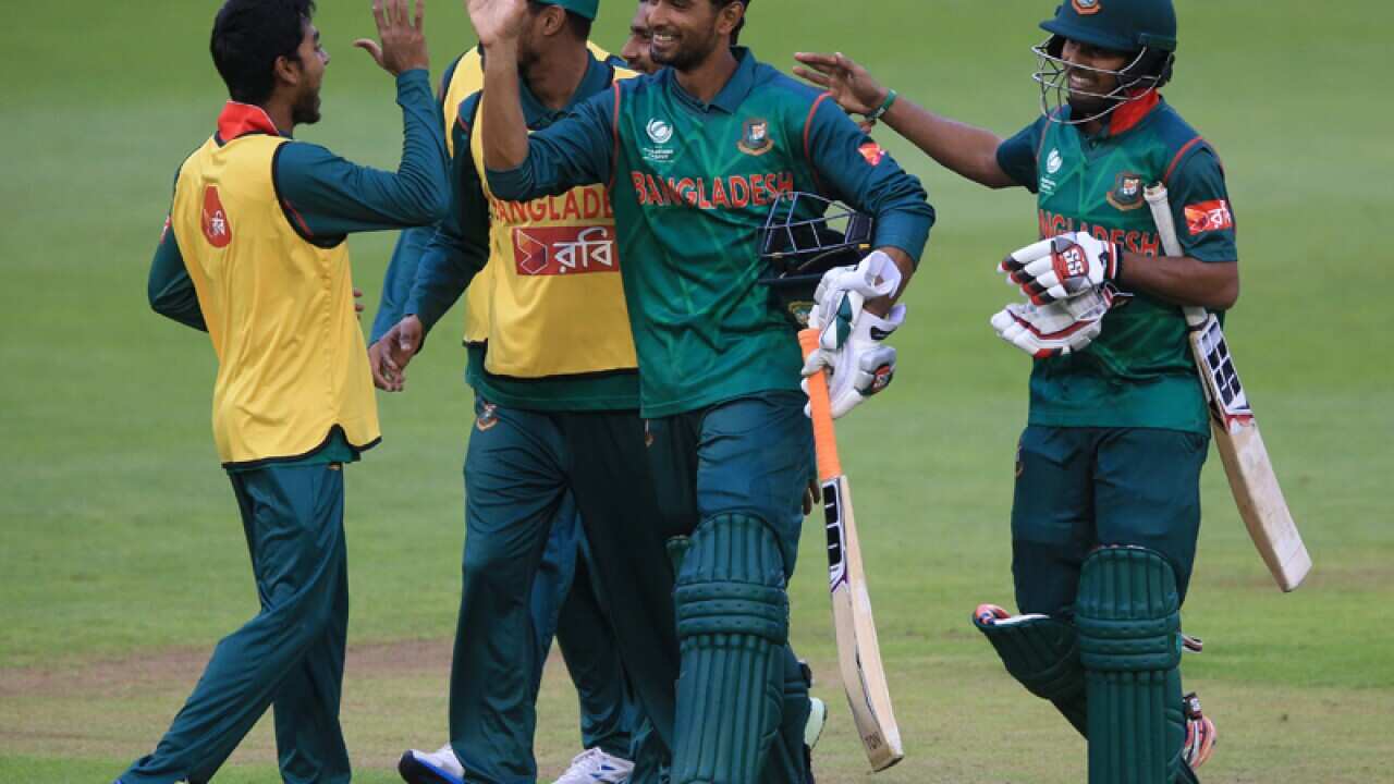 Bangladeshi players celebrate after winning their match