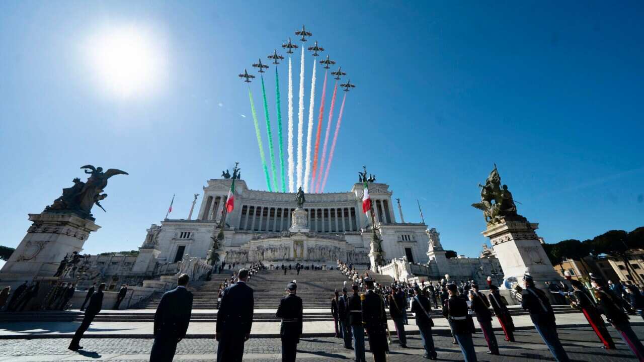 A handout photo made available by the Chigi Palace Press Office shows Italian Prime Minister Mario Draghi attending a wreath-laying ceremony at the Altar of the Fatherland marking the 76th anniversary of Liberation Day in Rome, Italy, 25 April 2021.