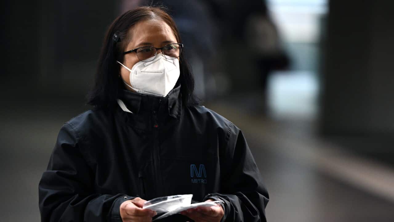 A woman wearing a face mask