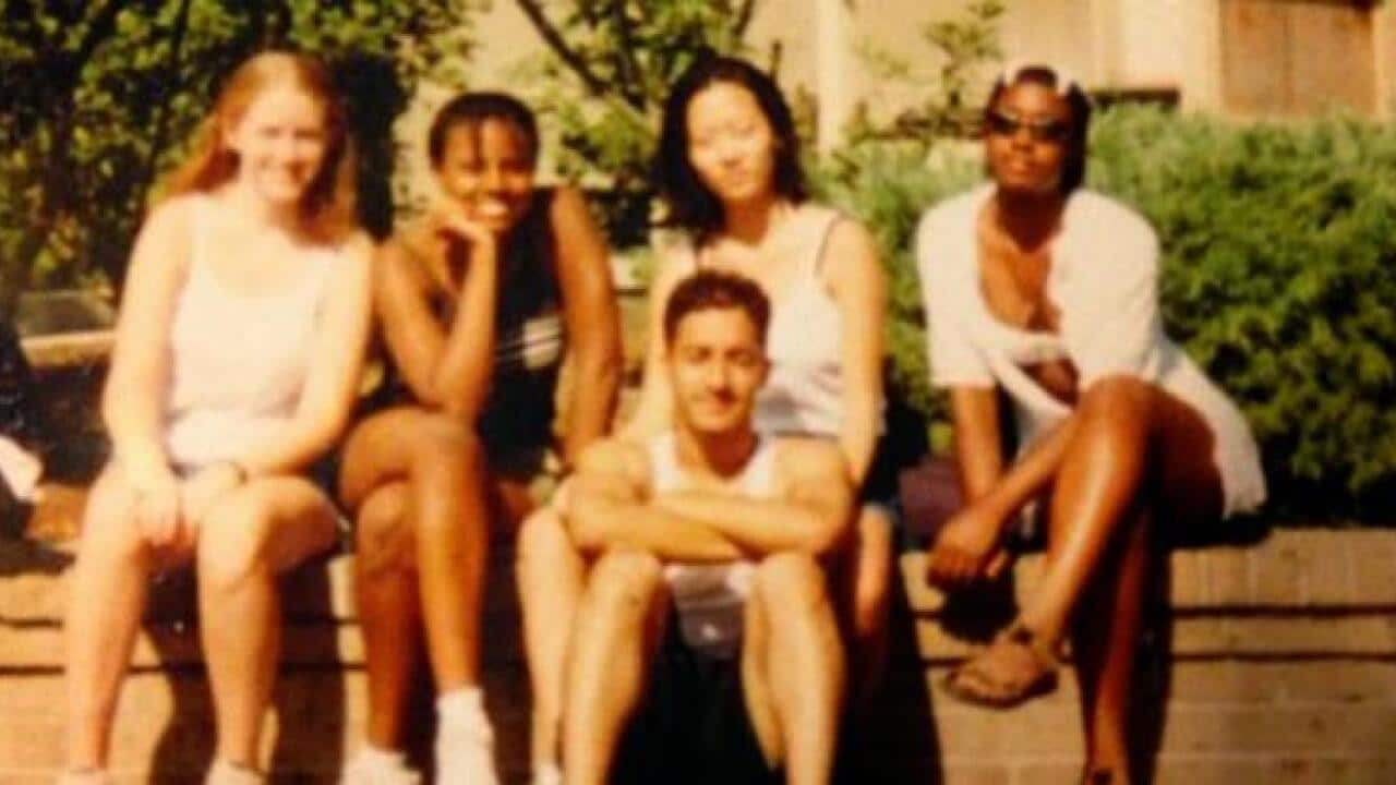Adnan Syed, center, sits in front of Hae Min Lee during their high school days. (Photo courtesy of This American Life)