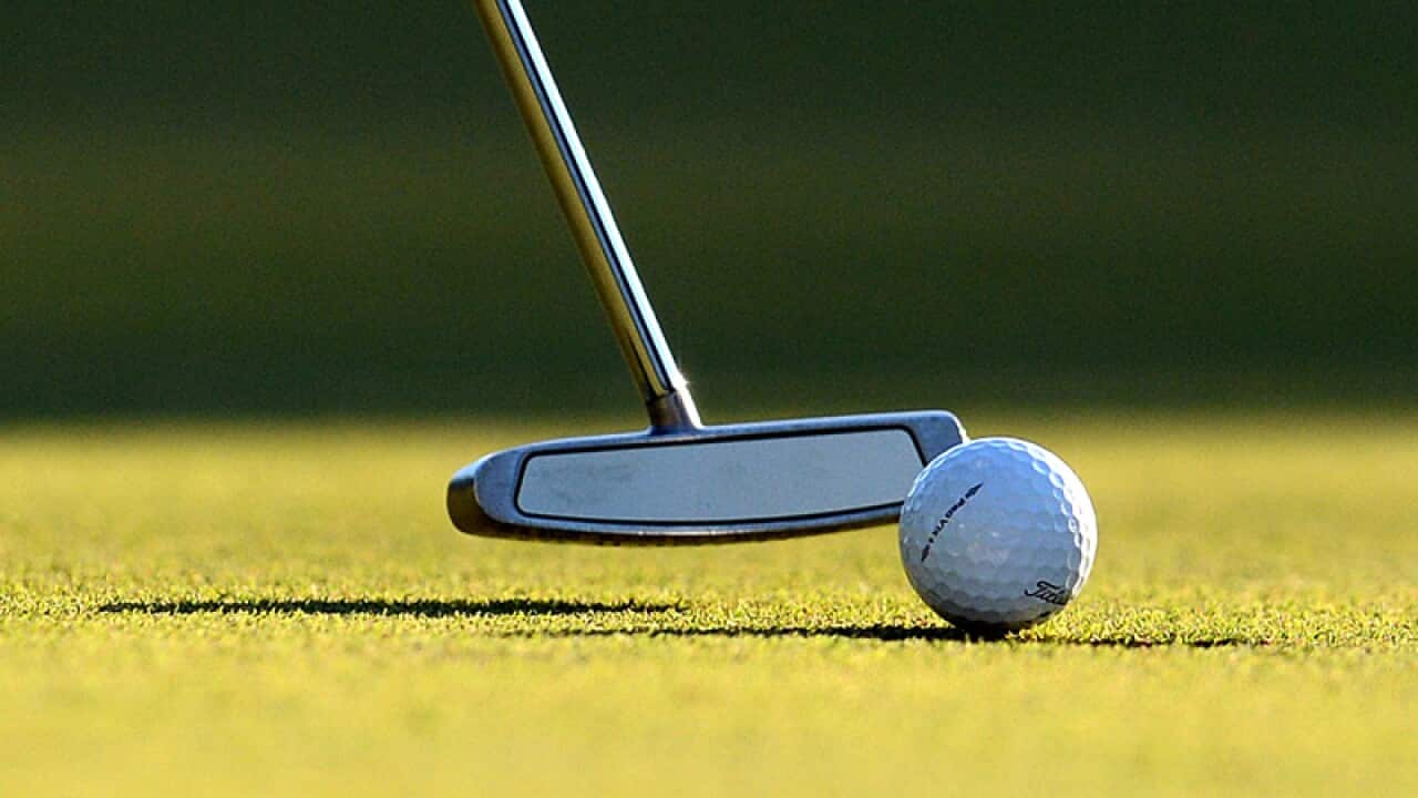 A golf ball is putted