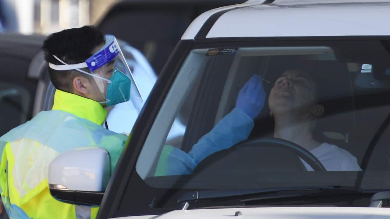 Residents and visitors to the eastern suburbs get tested for COVID-19 at St Vincents Hospital pop-up testing clinic at Bondi Beach in Sydney.