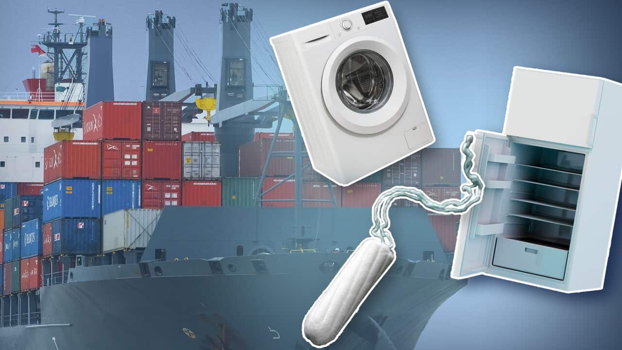 An image of a ship to the left, with a fridge, washing machine and tampon in front of it.