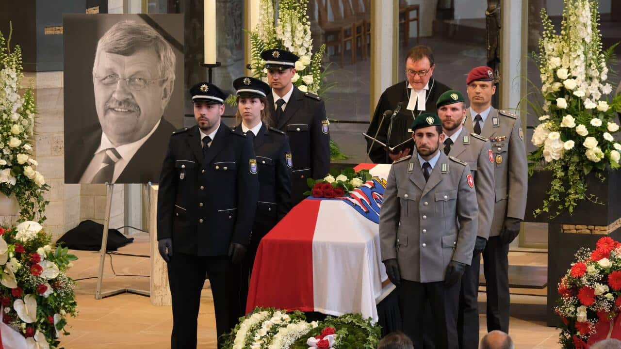 An honor guard at the coffin of the murdered German politician Walter Lübcke during his memorial service this month in Kassel, Germany.