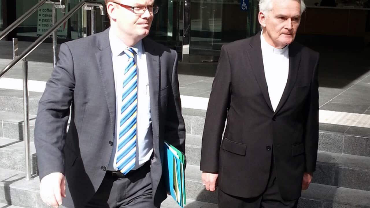 Bishop Max Davis (right)