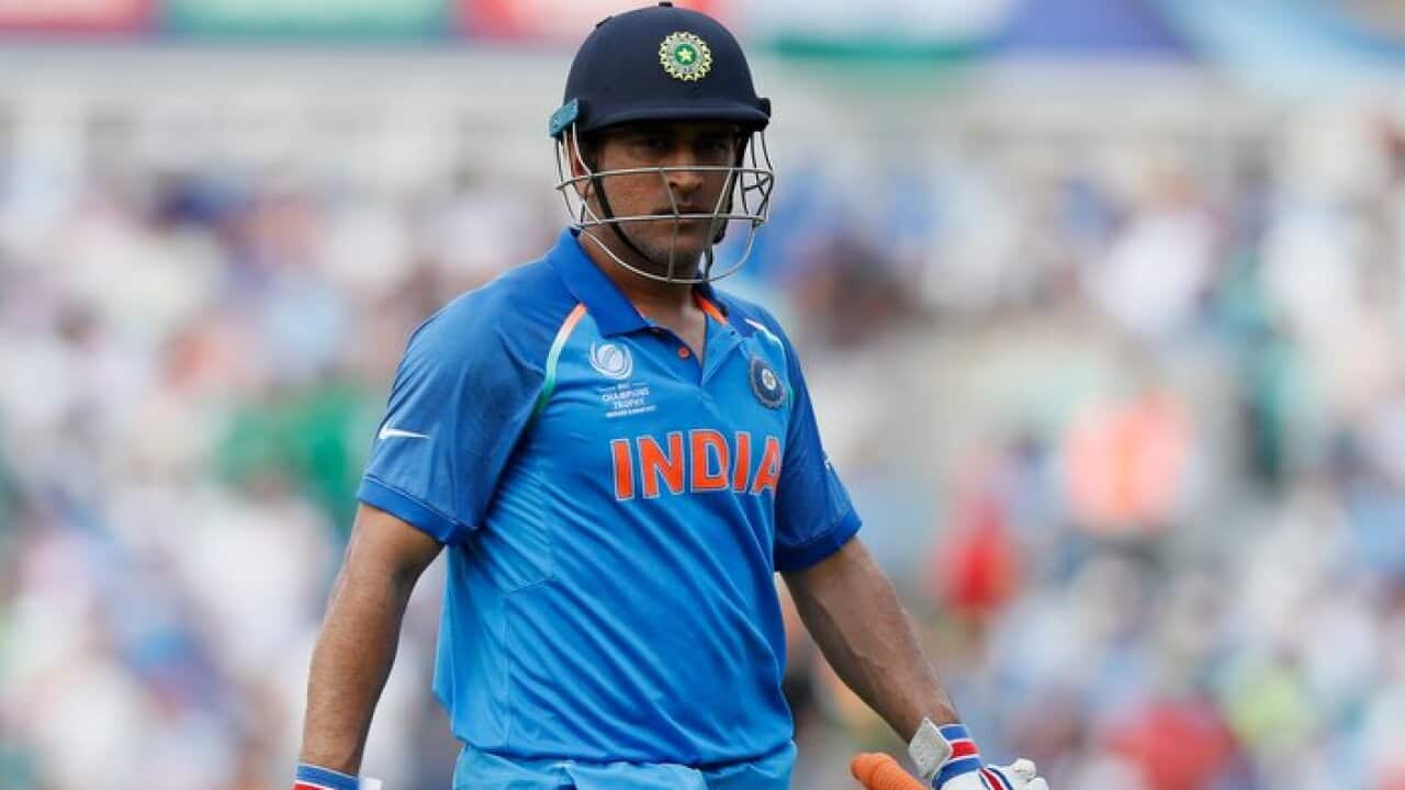 India's MS Dhoni leaves the pitch after he was caught by Pakistan's Imad Wasim during the ICC Champions Trophy final at The Oval in London, Sunday, June 18, 2017. (AP Photo/Kirsty Wigglesworth)