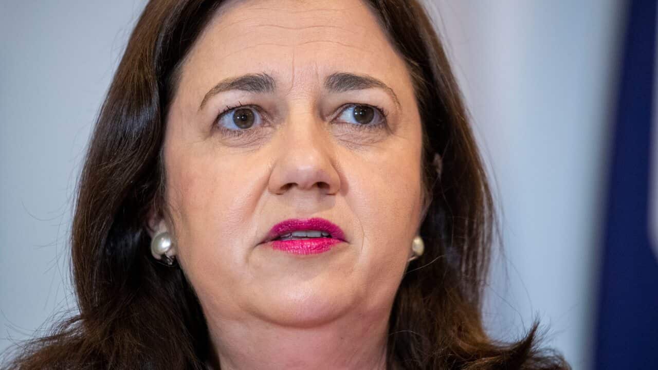 Queensland Premier Annastacia Palaszczuk urges travellers to delay plans if possible.