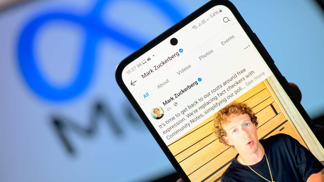 A phone with Mark Zuckerberg's personal Facebook account displayed on the screen
