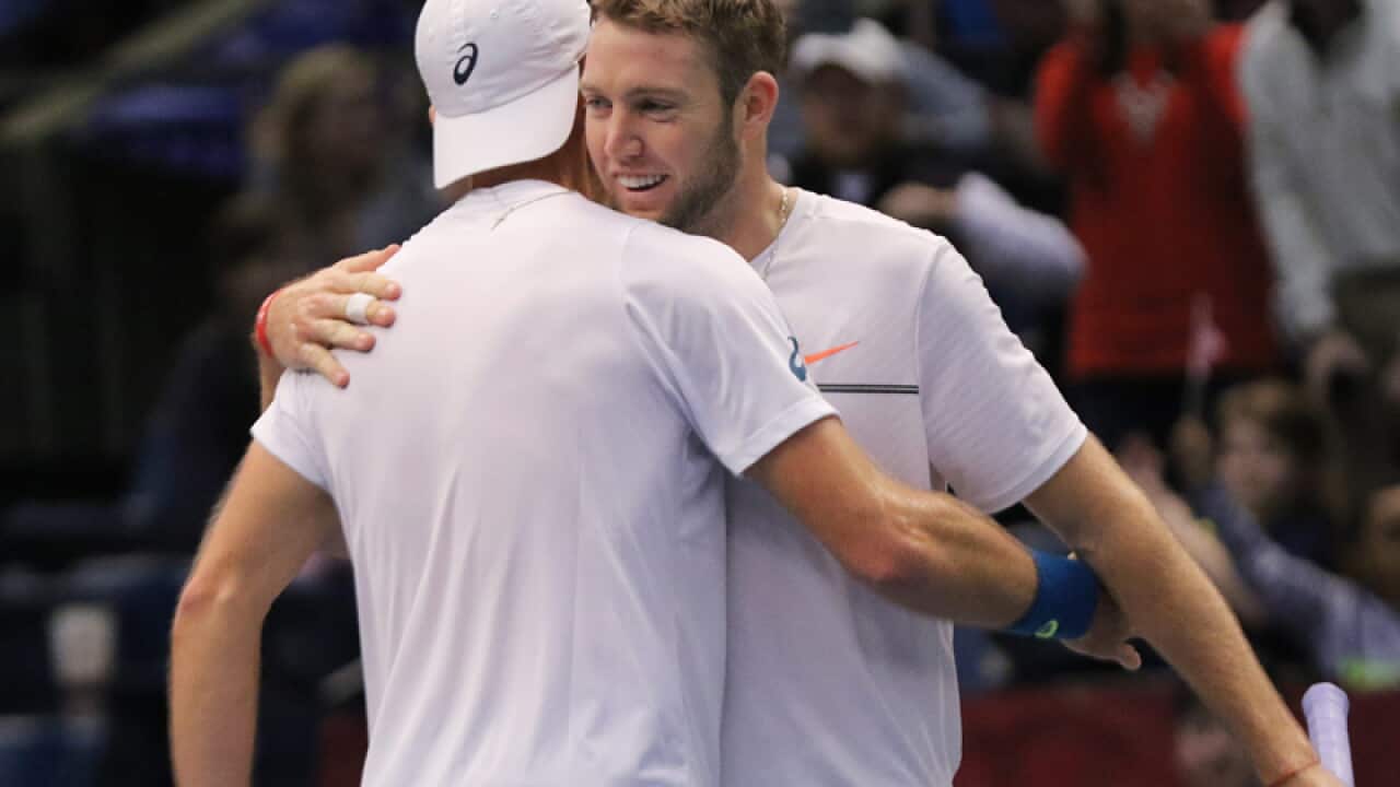 Steve Johnson (L) and Jack Sock (R) of USA celebrate