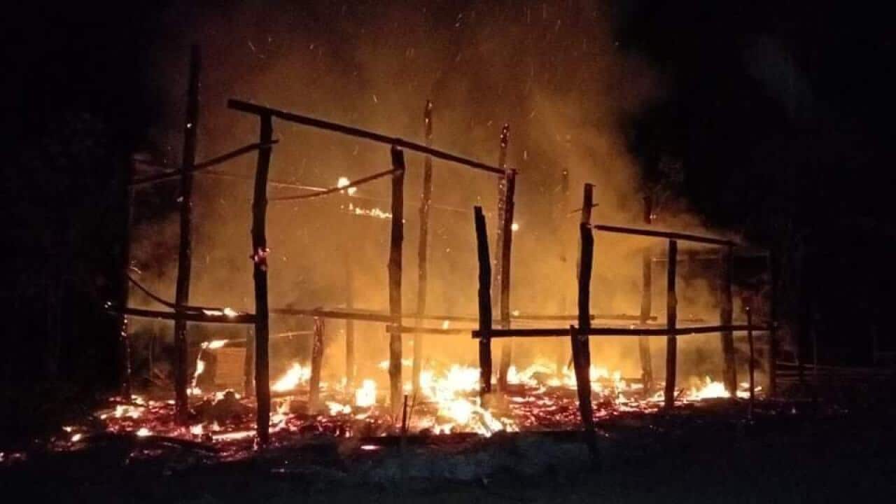 A home burning down from Burma Army's airstrike in Mutraw District of Karen State, 5th February 2022.
