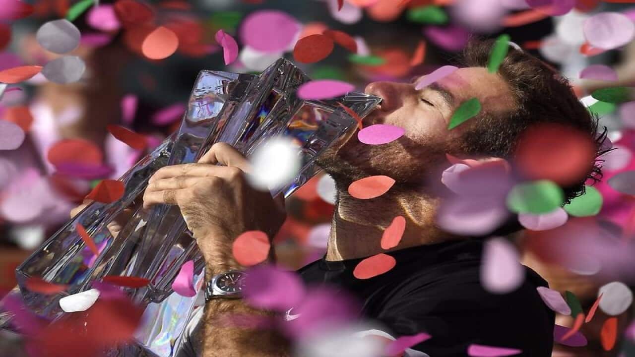 Argentinian tennis player Juan Martin del Potro with the trophy