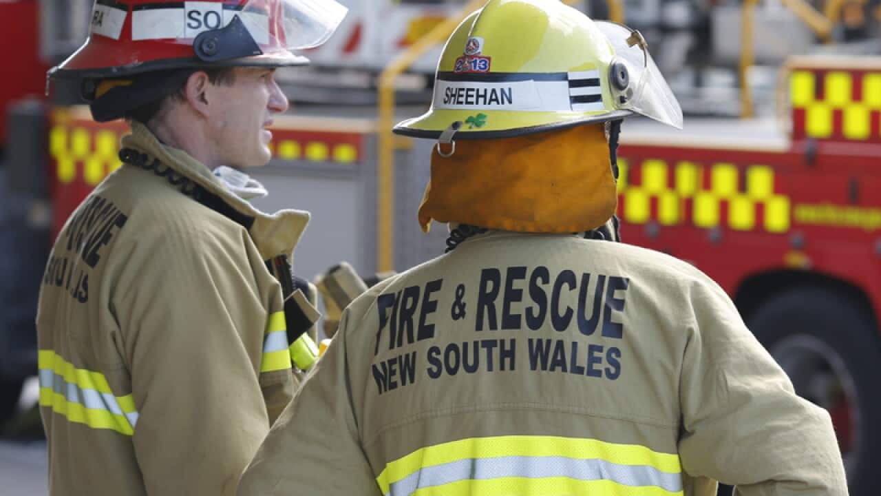 Firefighters at the scene of a fire