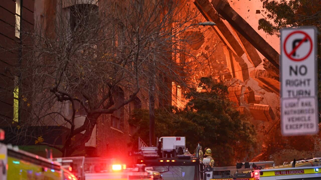 Firefighters at the scene of a building fire.