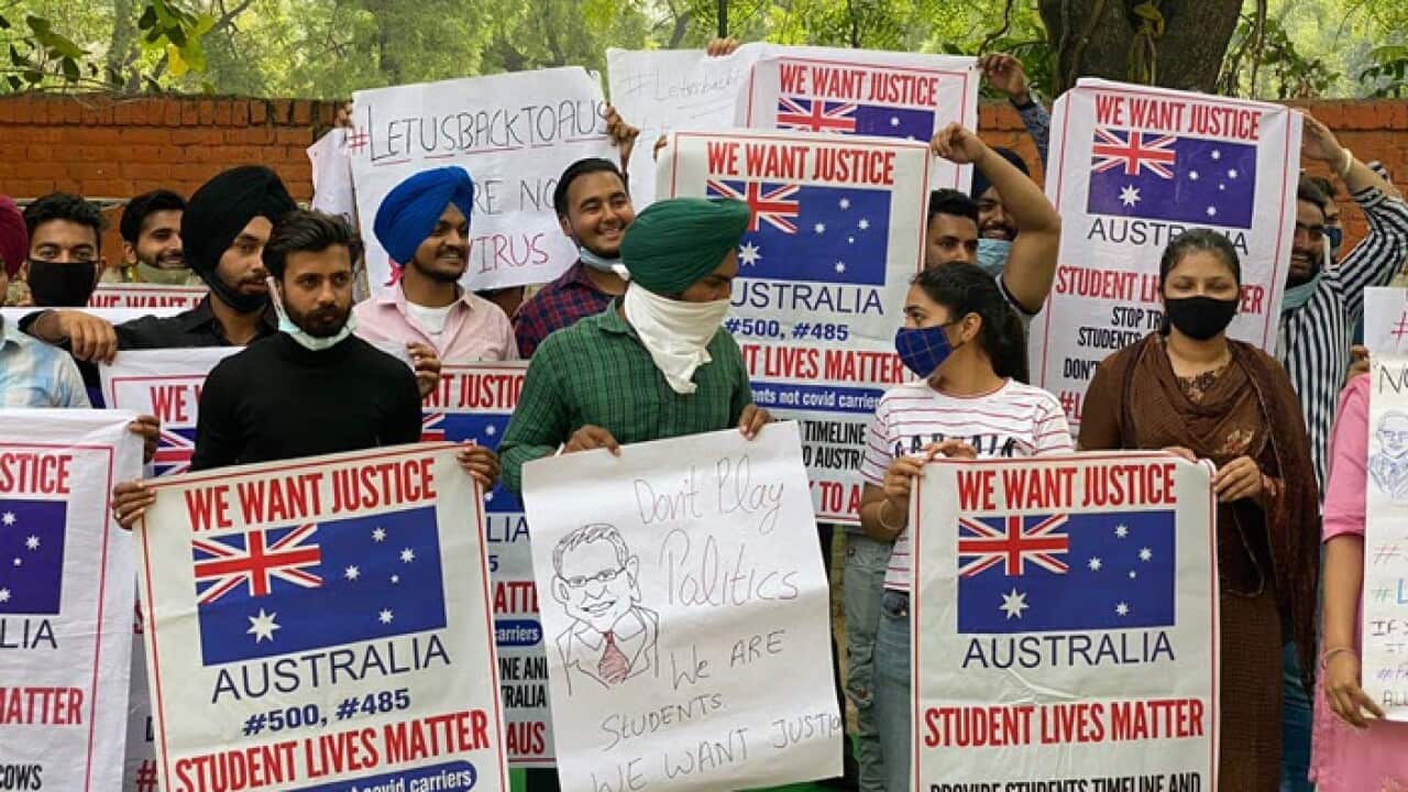 International students and temporary migrants protest in New Delhi against the Australian government's border closure.