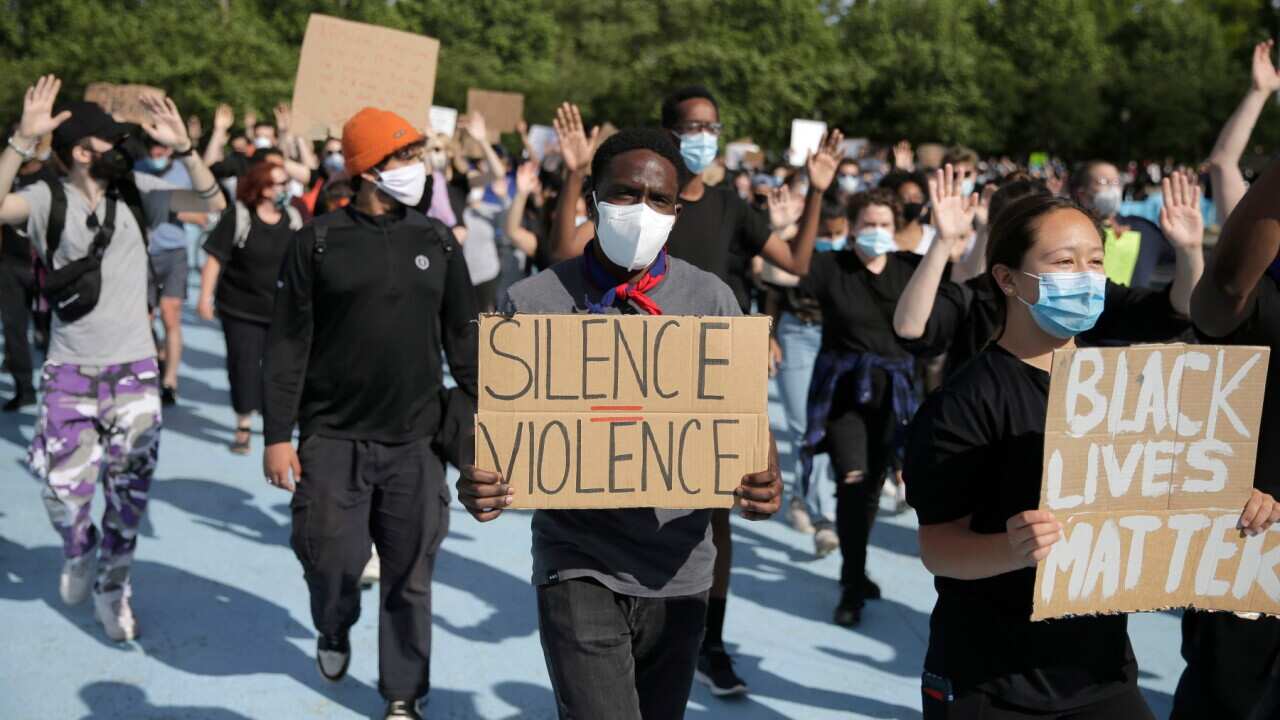 Demonstrators took to the streets of New York City to protest the death of George Floyd, a black man who was killed in police custody in Minneapolis on May 25.