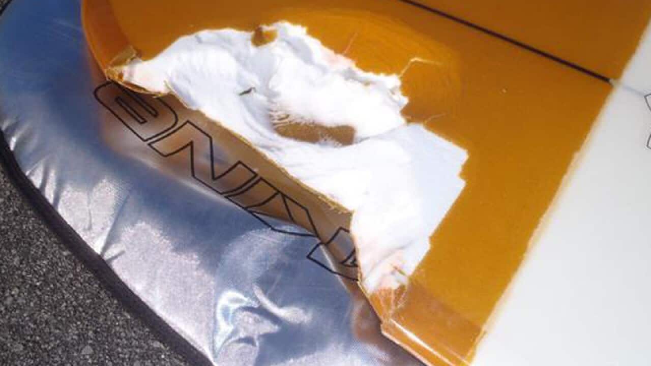 A damaged surfboard