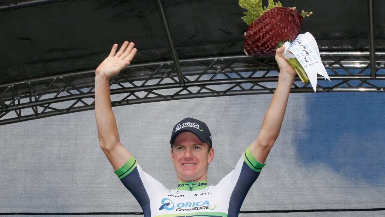 Simon Clarke celebrates a second place finish in the Cadel Evans Great Ocean Road Race earlier this year
