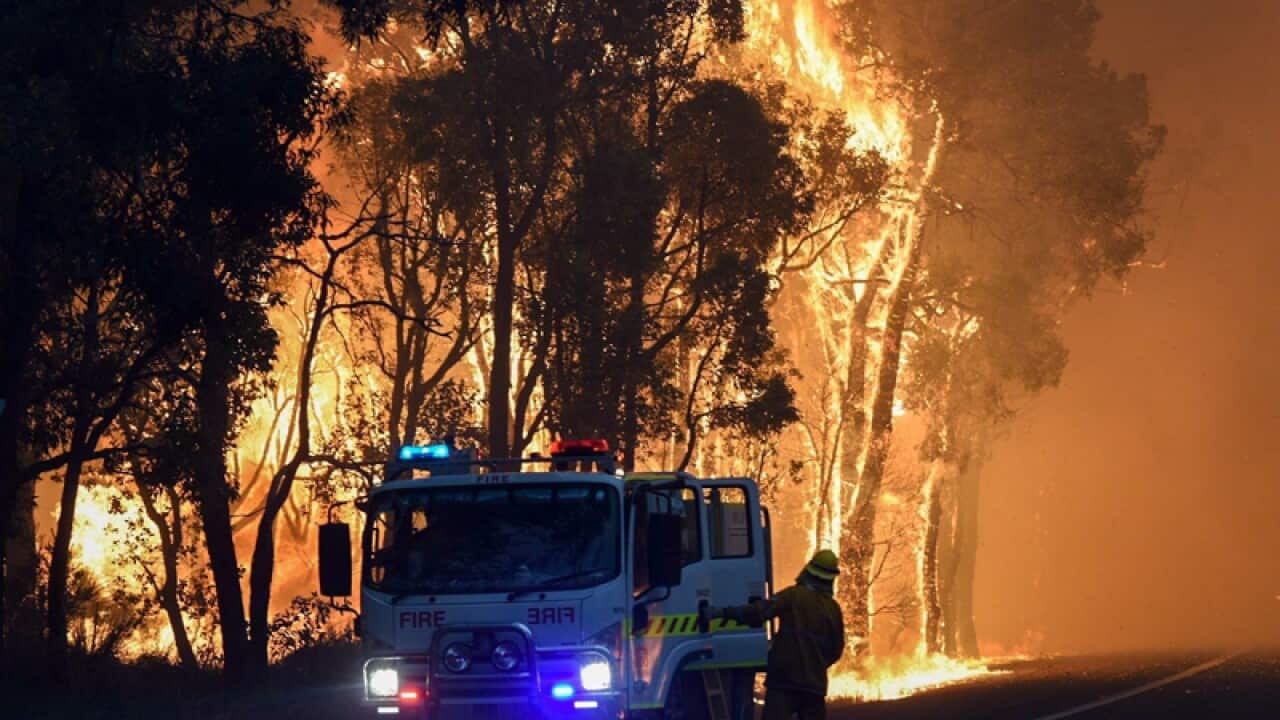 Firefighters battle a fire at Yarloop in WA's south