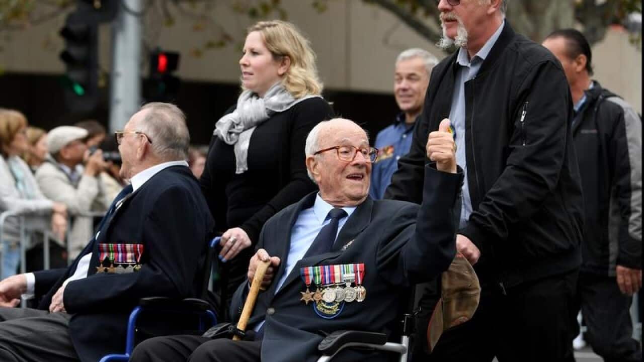 Veterans take part in the march to the Shrine of Remembrance