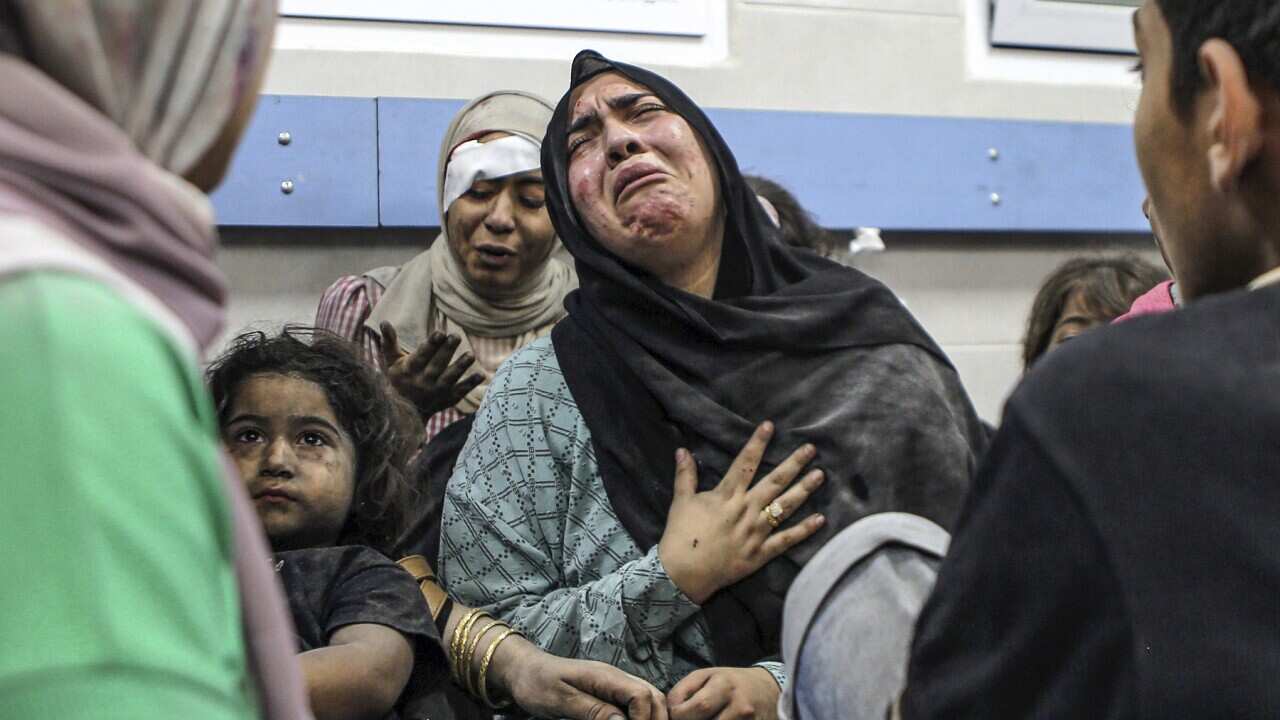 Tagata Palesitina i le falema'i i Gaza.