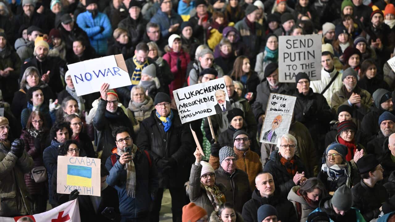 Protesters hold Ukrainian flags and banners during a demonstration to protest against the Russian invasion of Ukraine, at Sergel's Square in central Stockholm, Sweden, 02 March 2022. EPA/Fredrik Sandberg SWEDEN OUT