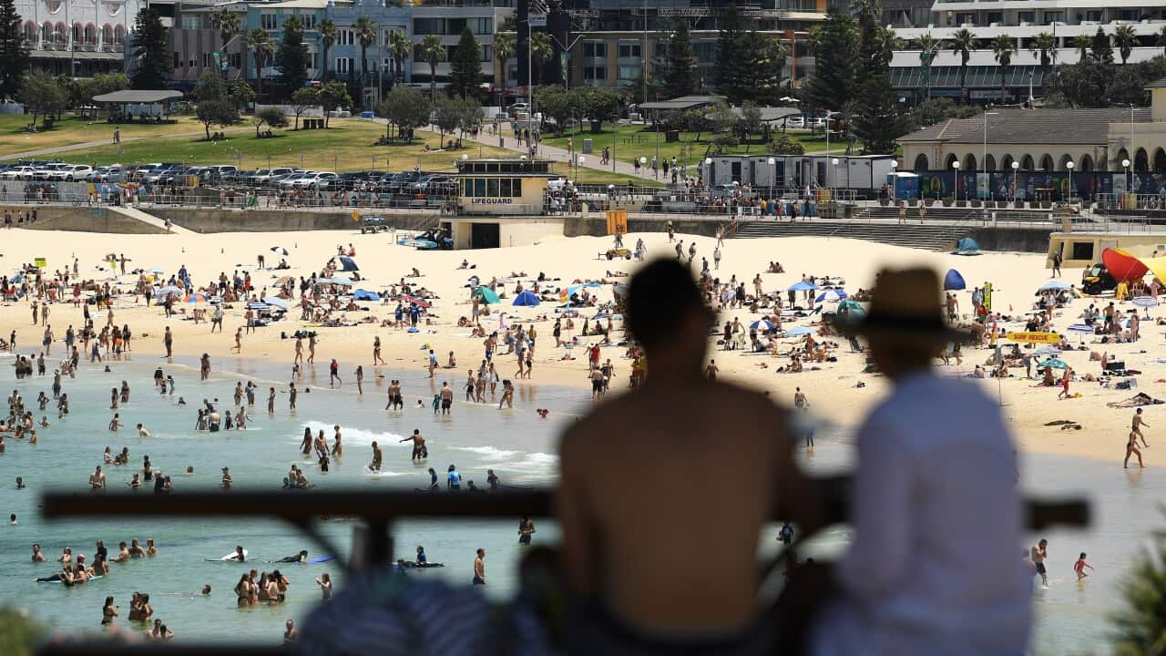 People head to Bondi Beach in Sydney during heatwave conditions on Saturday, 28 November.