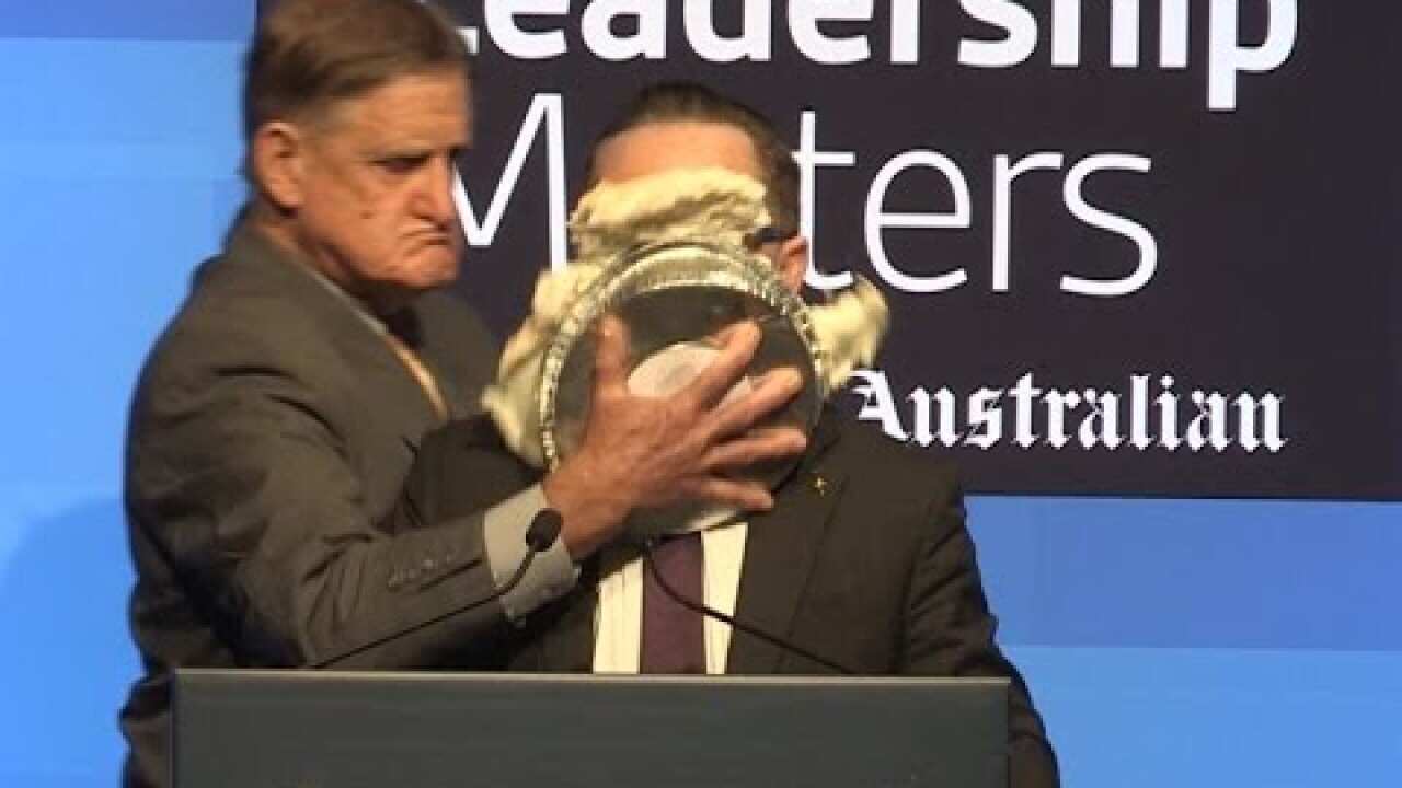 Qantas boss Alan Joyce pie faced