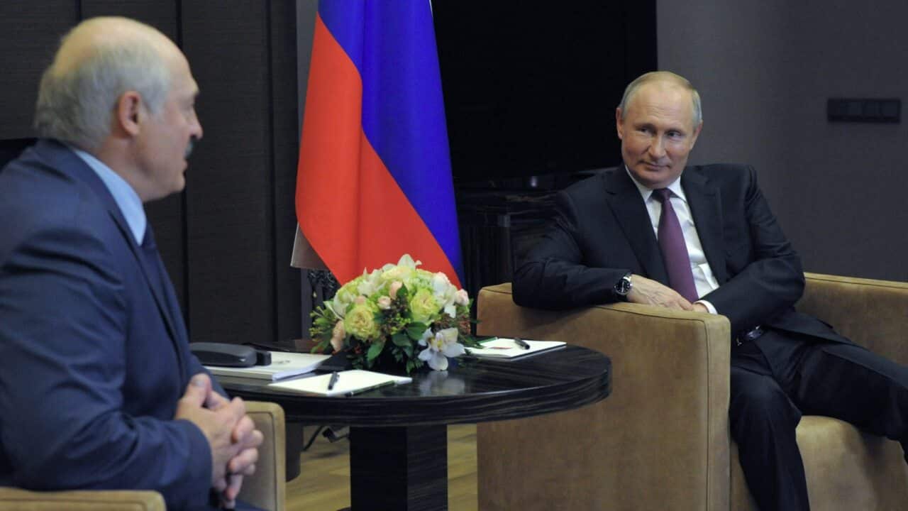 Russian President Vladimir Putin (R) speaks with Belarusian President Alexander Lukashenko (L) during their meeting in Sochi, Russia, 28 May, 2021