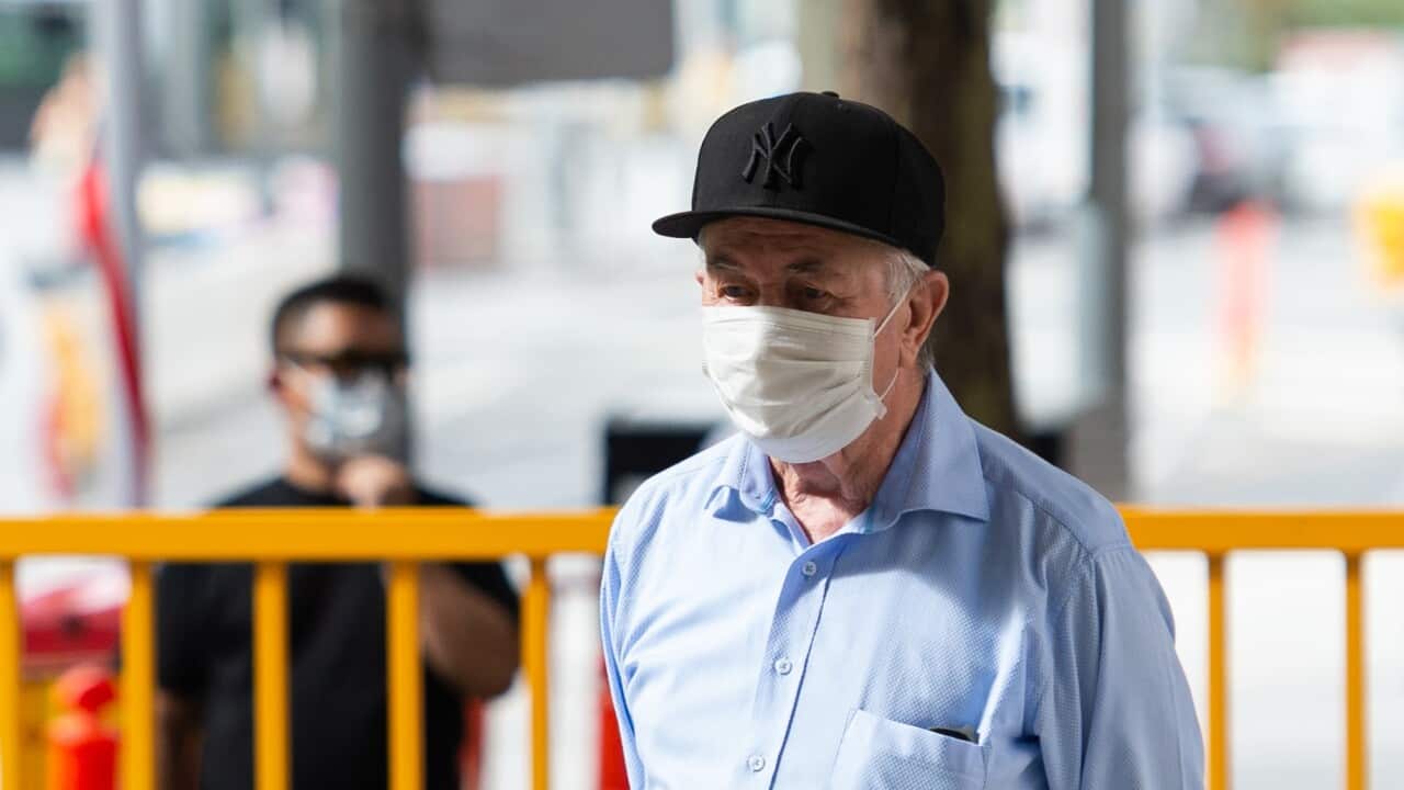 A man wears in mask in Melbourne earlier in the pandemic.