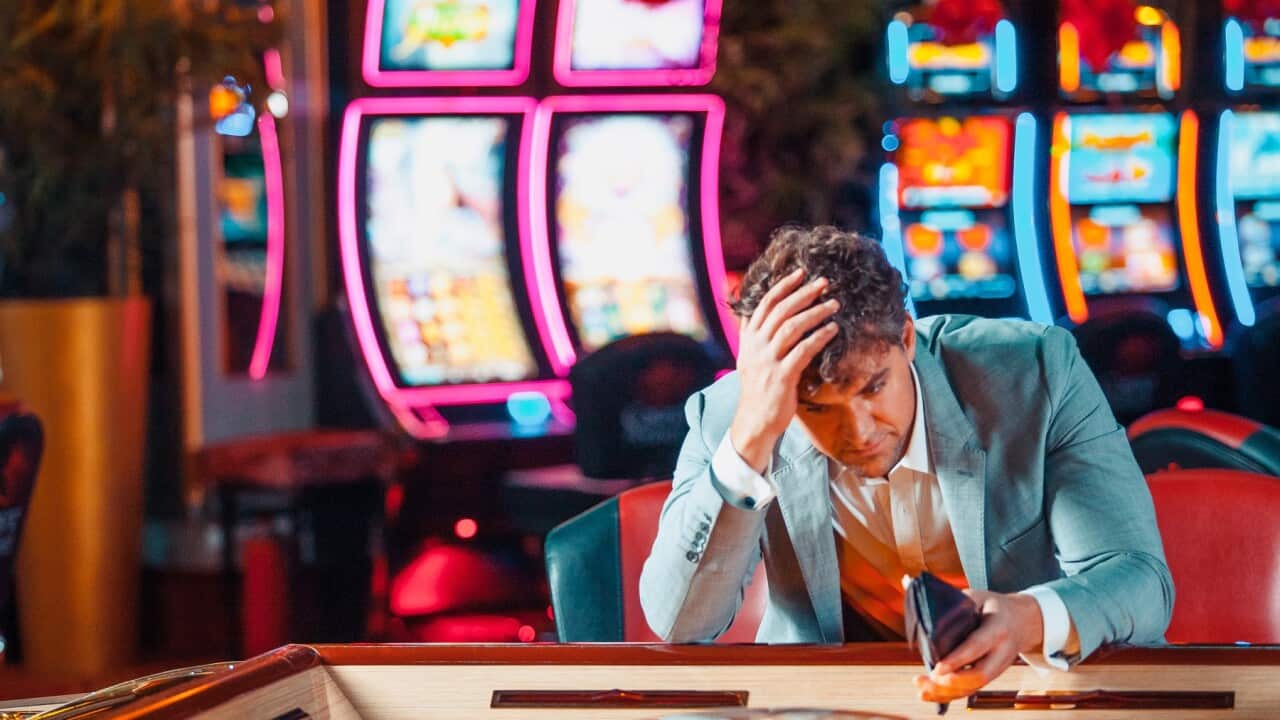 Man loosing his money in the casino