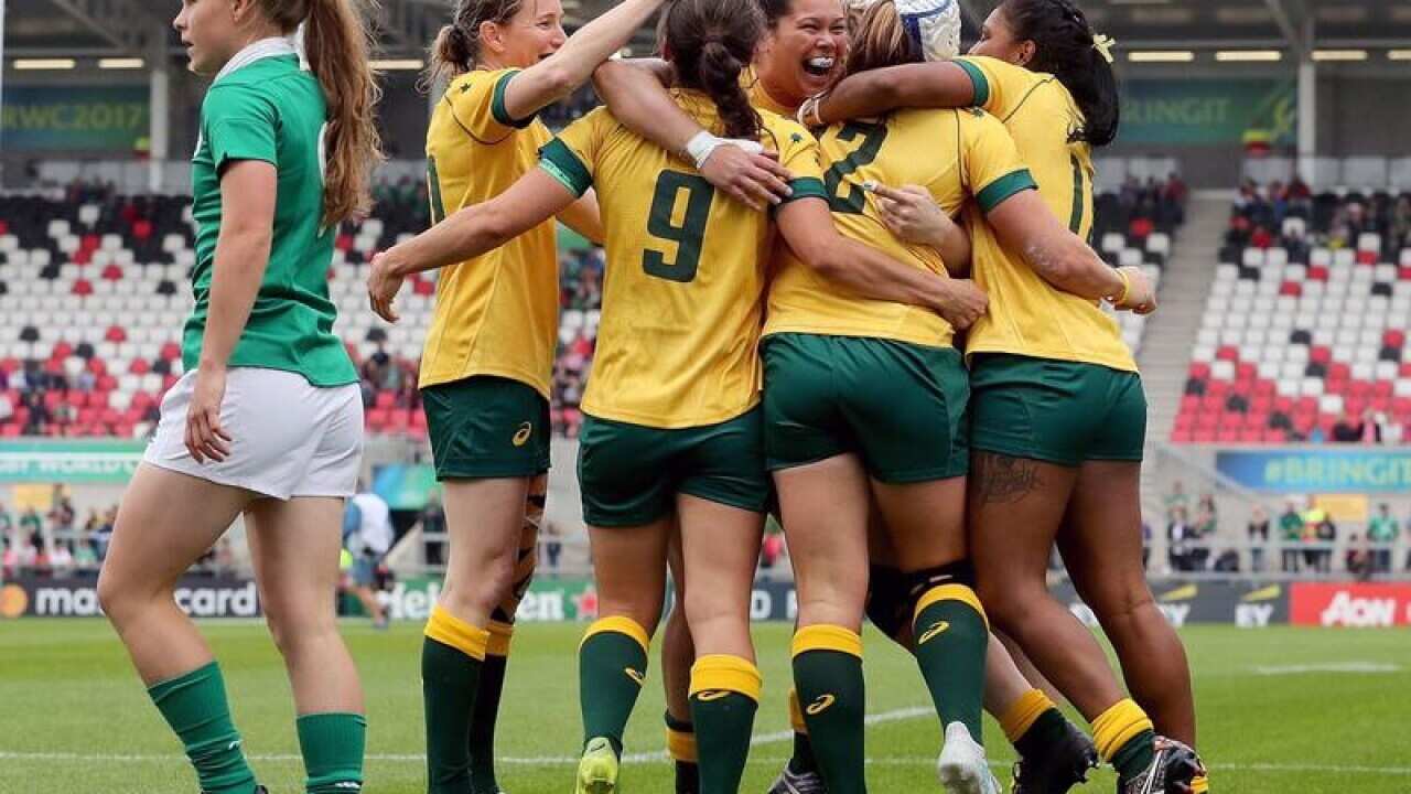 Australian captain Sharni Williams (second right)
