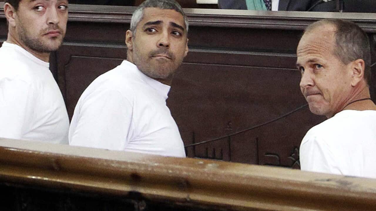 Baher Mohamed (L) Canadian-Egyptian Mohammed Fahmy (C), Peter Greste